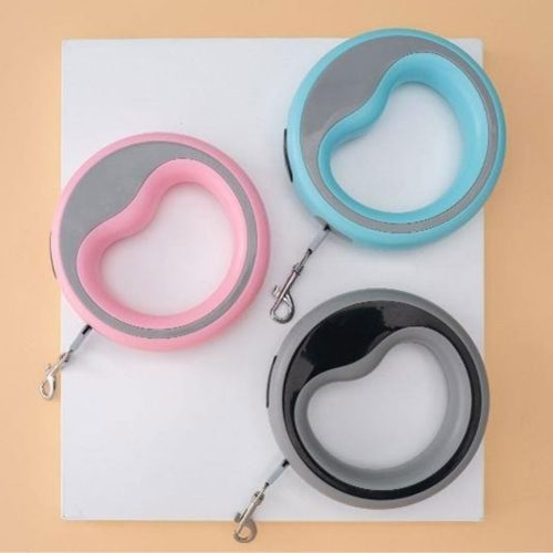 2.5M retractable dog lead in light blue, soft pink, and sleek grey, showcasing all three colours.