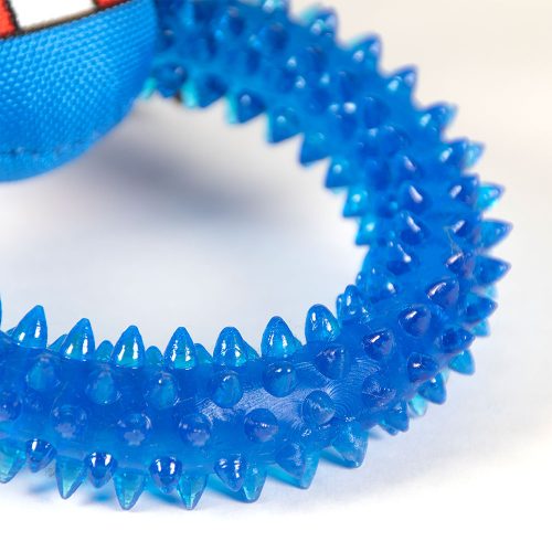 Close-up of the textured teething ring on the Captain America dog toy, designed to support chewing and gum massage.