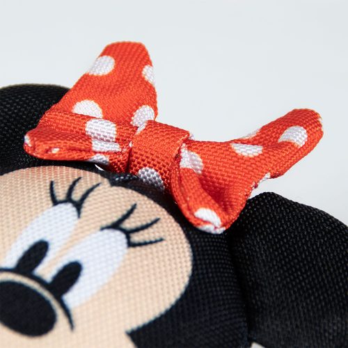 Close-up of the Minnie Mouse dog chew toy's signature red bow with white polka dots, highlighting the plush detail and stitching.