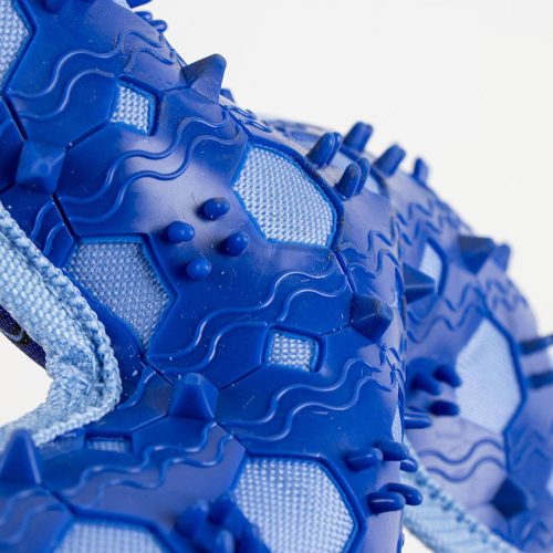 Close-up of Stitch character design on the surface of the blue TPR boomerang dog toy.